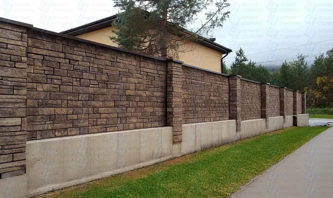 Бутовый забор с декоративными коваными элементами и арками